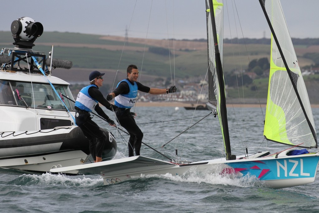 Peter Burling and Blair Tuke celebrate in the 49er after winning their Olympic Silver medal &copy; Richard Gladwell www.photosport.co.nz