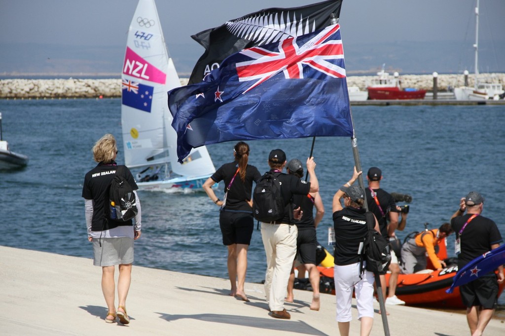  August 10, 2012 - Weymouth, England - New Zealand supporters welcom Jo Aleh and Olivia Powrie back to the dock after winning the Gold Medal in the Womens 470 © Richard Gladwell www.photosport.co.nz