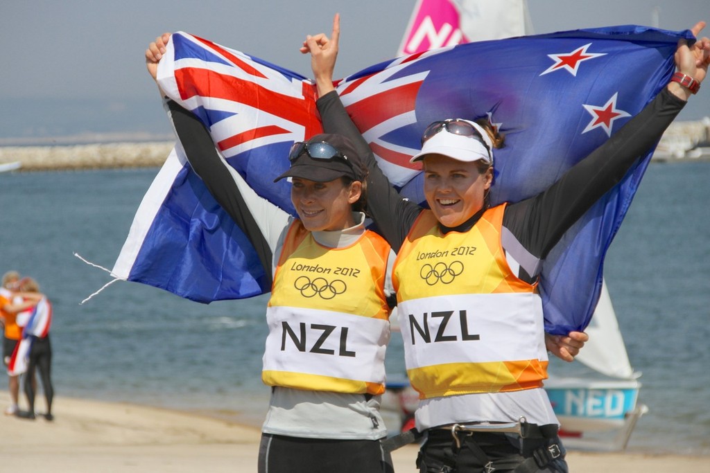  August 10, 2012 - Weymouth, England - Jo Aleh and Olivia Powrie celebrate after their Gold Medal win in the Womens 470 class © Richard Gladwell www.photosport.co.nz