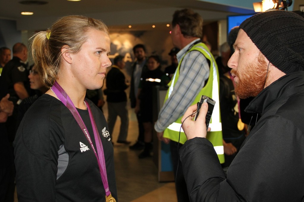  August 15, 2012 - Auckland, New Zealand- 470 Womesn Gold Medlaist, Olivia Powrie being interviewed on her return to Auckland photo copyright Richard Gladwell www.photosport.co.nz taken at  and featuring the  class