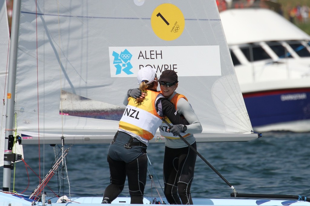  August 10, 2012 - Weymouth, England - Olivia Powrie and Jo Aleh have a quick celebration after winning their Gold Medal photo copyright Richard Gladwell www.photosport.co.nz taken at  and featuring the  class