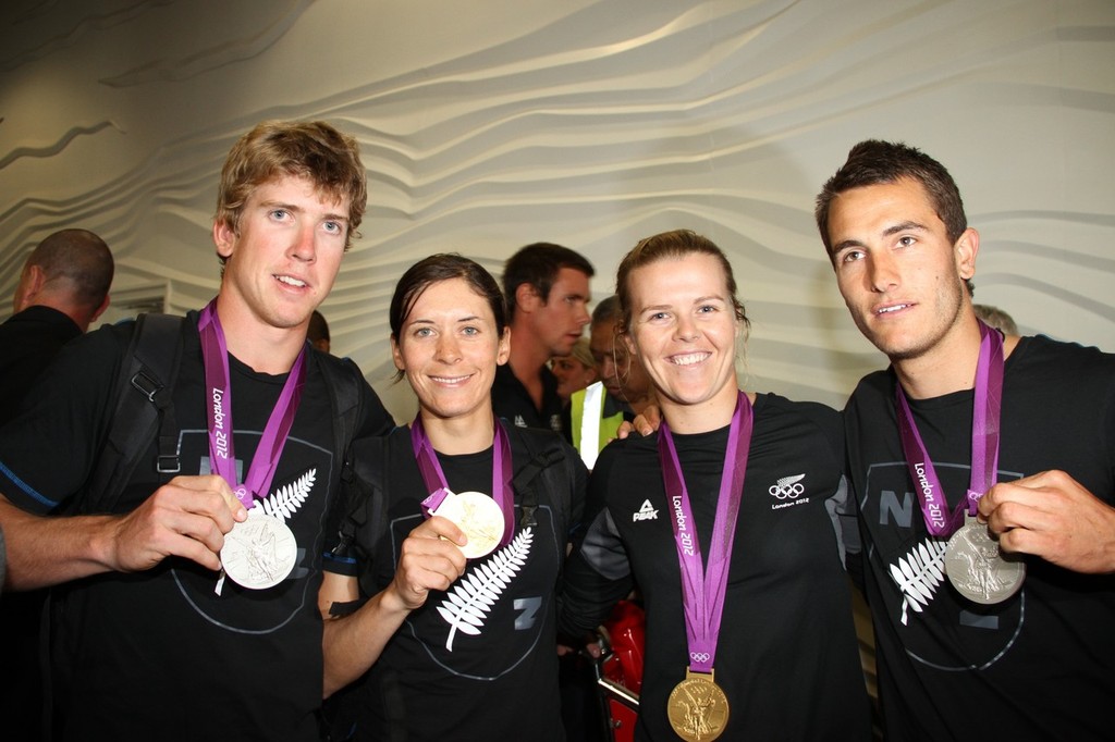  August 15, 2012 - Auckland, New Zealand- Peter Burling (49er - Silver), Jo Aleh (Womens 470 - Gold), Olivia Powrie (Womens 470 Gold), Blair Tuke (49er - Silver) on their arrival at Auckland Airport © Richard Gladwell www.photosport.co.nz