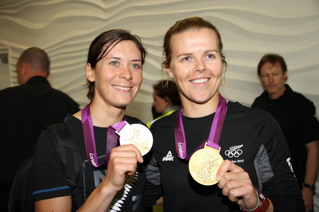 Jo Aleh (Womens 470 - Gold), Olivia Powrie (Womens 470 Gold), on their arrival at Auckland Airport © Richard Gladwell www.photosport.co.nz