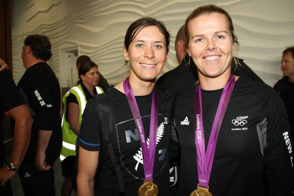 Jo Aleh (Womens 470 - Gold), Olivia Powrie (Womens 470 Gold) on their arrival at Auckland Airport © Richard Gladwell www.photosport.co.nz