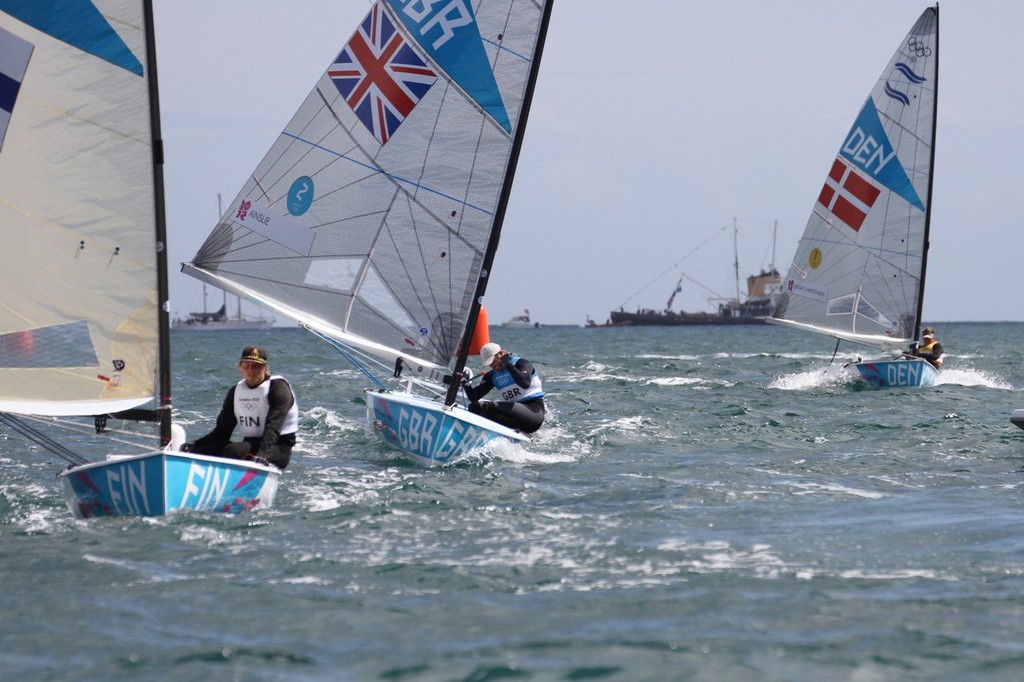  August 5, 2012 - Weymouth, England - Ben Ainslie's reaction at the moments he crosses the finish line to win his fourth Gold Medal, with Jenas Hogh-Christensen (DEN) who has just lost the Gold Medal, astern photo copyright Richard Gladwell www.photosport.co.nz taken at  and featuring the  class