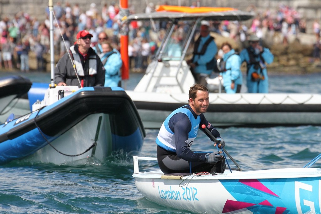  August 5, 2012 - Weymouth, England - Ben Ainslie leaves the Nothe folowed by his long-time coach, David Howlett photo copyright Richard Gladwell www.photosport.co.nz taken at  and featuring the  class