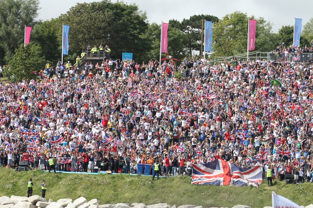  August 5, 2012 - Weymouth, England - Part of the crowd celebrating Ben Ainslie's win in the medal race. photo copyright Richard Gladwell www.photosport.co.nz taken at  and featuring the  class