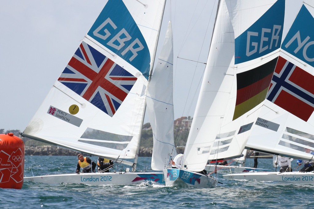  August 5, 2012 - Weymouth, England - Star class Medal race Iain Percy (GBR) with Andrew Simpson trails round the leeward mark for the last time in the Medal Race photo copyright Richard Gladwell www.photosport.co.nz taken at  and featuring the  class