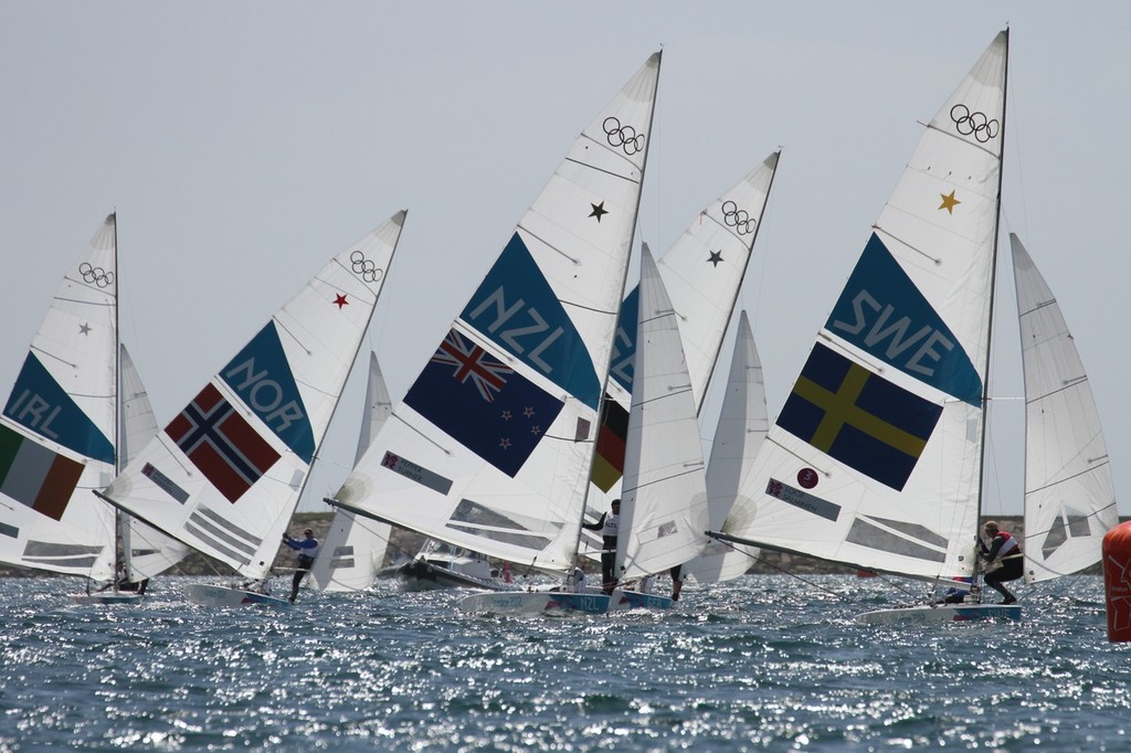  August 5, 2012 - Weymouth, England - New Zealand leads the fleet on the final leg of the Medal Race photo copyright Richard Gladwell www.photosport.co.nz taken at  and featuring the  class