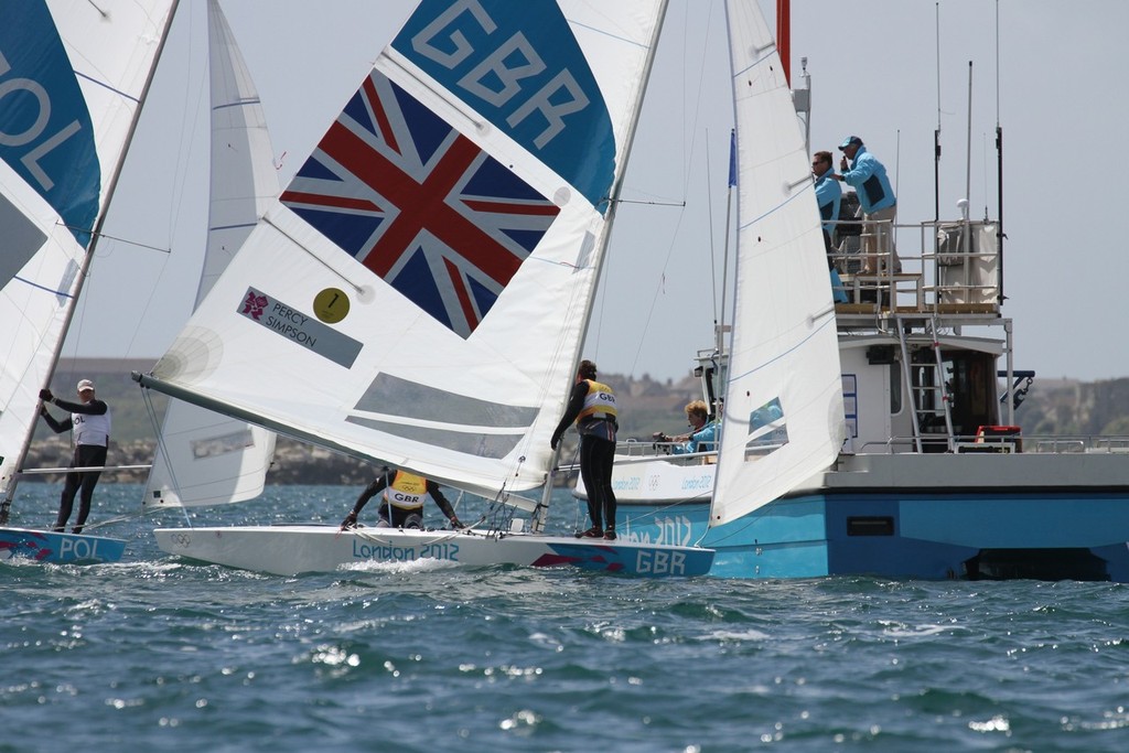  August 5, 2012 - Weymouth, England - Silver medalist, Iain Percy (GBR) crosses the finaish line in the Star class. Thre British crew dropped three places in the final 10 metres and with it their chances of winning a second Gold medal in the Star class photo copyright Richard Gladwell www.photosport.co.nz taken at  and featuring the  class