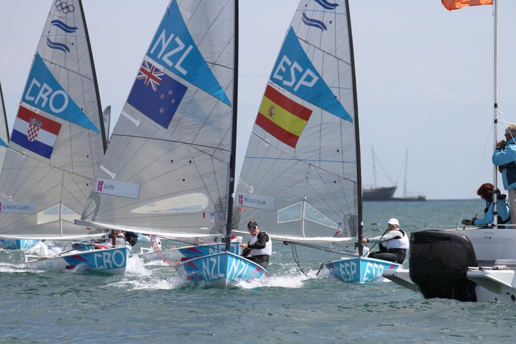  August 5, 2012 - Weymouth, England - Finns charge at the finish line at the end of the Medal Race photo copyright Richard Gladwell www.photosport.co.nz taken at  and featuring the  class