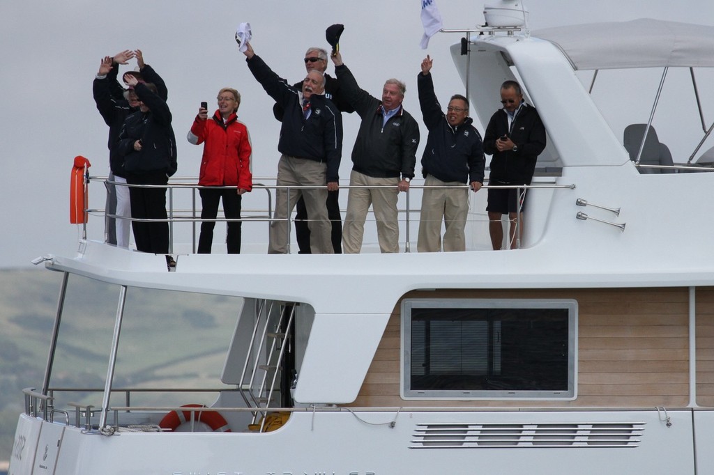  August 5, 2012 - Weymouth, England - Ben Aisnlie is cheered by spectators on the way back to Weymouth photo copyright Richard Gladwell www.photosport.co.nz taken at  and featuring the  class