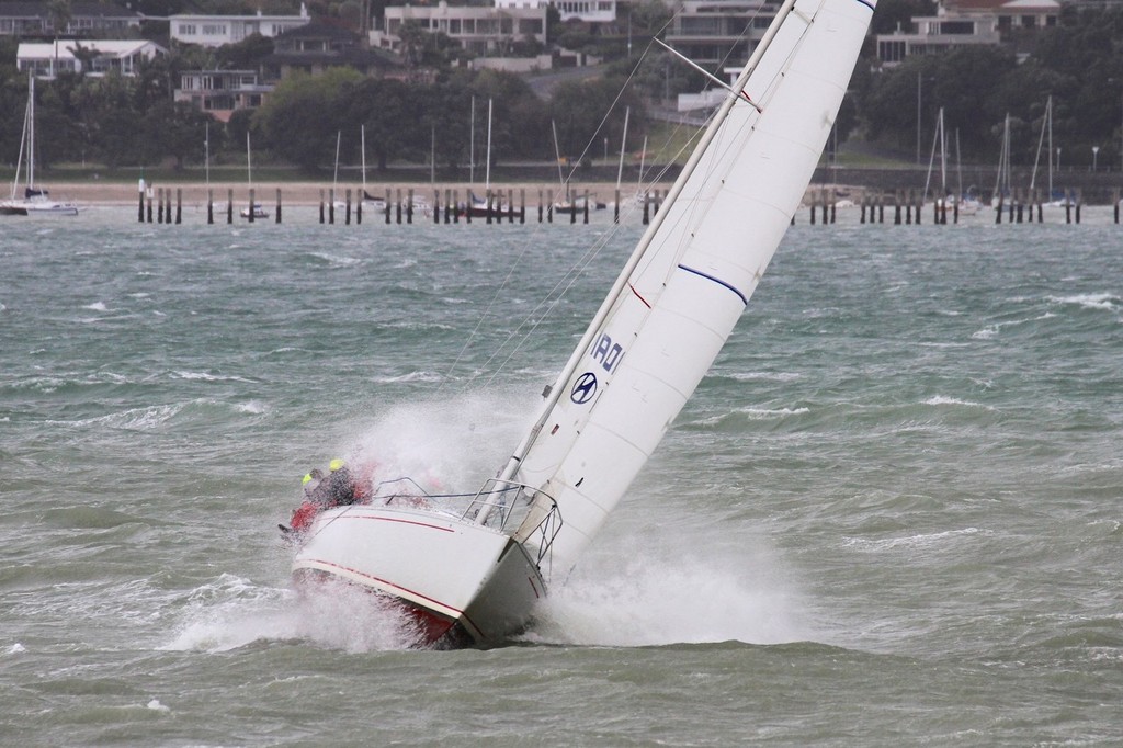 Playbuoy (Roy Dickson) cops a wet one - RNZYS Winter Series - Final Race September 15, 2012 photo copyright Richard Gladwell www.photosport.co.nz taken at  and featuring the  class