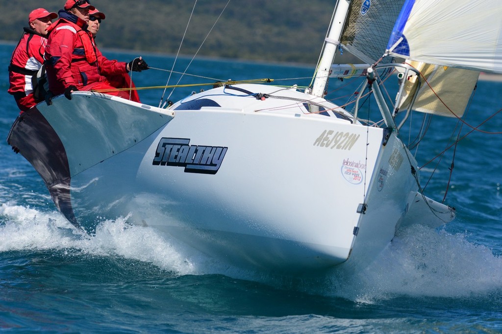 Stealthy - on fire. Telcoinabox Airlie Beach Race Week 2012 photo copyright Telcoinabox Airlie Beach Race Week taken at  and featuring the  class