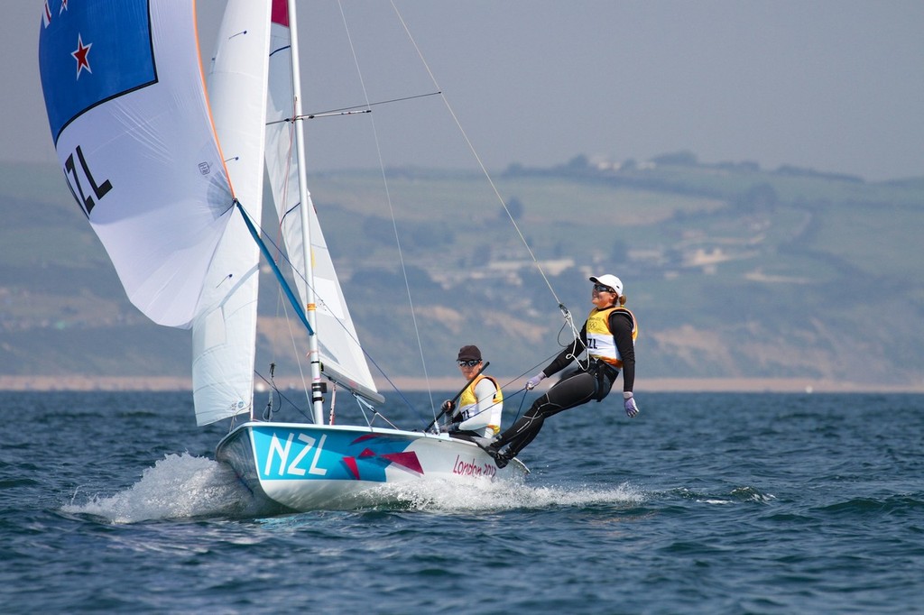 Olivia Powrie and Jo Aleh are all smiles as they cross the finish line to win the Gold Medal in Weymouth © Richard Gladwell www.photosport.co.nz