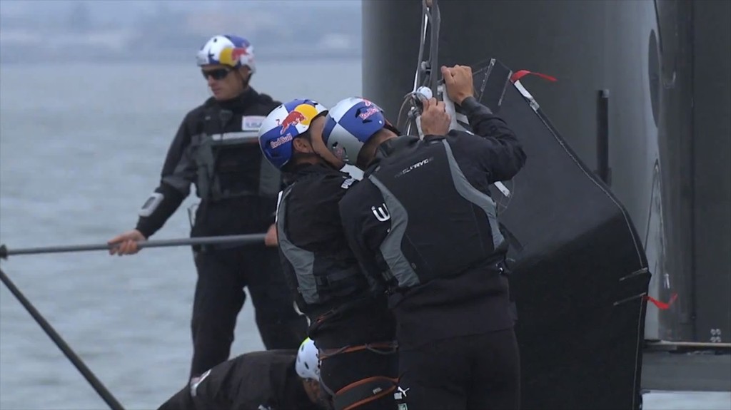 Fitting up the jib for hoisting, skipper Jimmy Spithill is tiller steering, AC72 - First Sail - August 31, 2012 San Francisco © SW