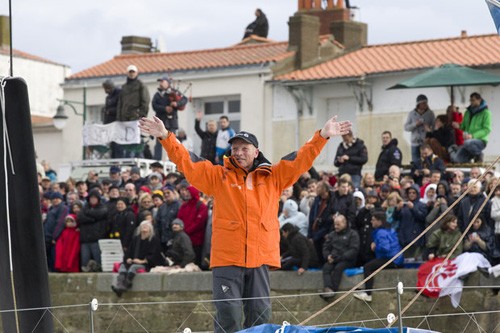 Mike Golding onboard his IMOCA Open60 yacht Gamesa as he passes through the canal prior to the start of solo non stop around the world yacht race – The Vendee Globe 2012. Les Sables d Olonne. France © Mark Lloyd/ DDPI/Vendee Globe http://www.vendeeglobe.org/en/