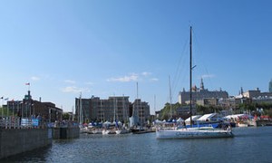 A class40 leaving the Bassin Louise in Quebec - Transat Québec Saint-Malo 2012 photo copyright Transat Québec Saint-Malo taken at  and featuring the  class