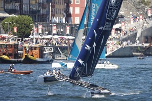 Act 4, Porto, Extreme Sailing Series. Day 04. Images on the final day of racing, showing Groupe Edmond De Rothschild, skippered by Pierre Pennec (FRA), with tactician Arnaud Psarofaghis (SUI), mainsail trimmer Herv? Cunningham (FRA), headsail trimmer Romain Petit (FRA), and bowman Bernard Labro (FRA). 
 Porto, Portugal. 

Credit: Lloyd Image - Extreme Sailing Series 2012 photo copyright Roy Riley / Lloyd Images http://lloydimagesgallery.photoshelter.com/ taken at  and featuring the  class