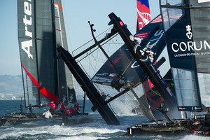 Oracle Team USA digs the bows in and capsizes at the first mark in the first fleet race of day four of the America's Cup World Series, San Francisco. 6/10/2012 photo copyright  SW taken at  and featuring the  class