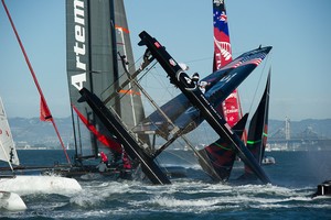 Oracle Team USA digs the bows in and capsizes at the first mark in the first fleet race of day four of the America's Cup World Series, San Francisco. 6/10/2012 photo copyright  SW taken at  and featuring the  class