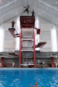 Emirates Team New Zealand AC72 sailors practice safety procedures in the Henderson West Wave dive pool. Glenn Ashby jumps from the 10M platform. 7/11/2012 photo copyright Chris Cameron/ETNZ http://www.chriscameron.co.nz taken at  and featuring the  class