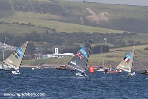 Triple Olympic gold medallist Ben Ainslie wins Gold in the Finn class, with the White Horse in the background. photo copyright Ingrid Abery http://www.ingridabery.com taken at  and featuring the  class