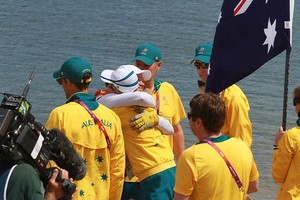 Olympic Games Sailing at Weymouth, Dorset August 2012. Australia's Nathan Outteridge (helmsman in baseball cap) and Ian Jensen celebrate winning gold in the 49er class at the London Olympics. photo copyright Ingrid Abery http://www.ingridabery.com taken at  and featuring the  class