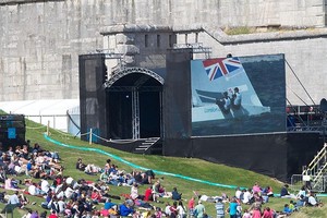 Spectator viewing on a big screen against the castle wall photo copyright Ingrid Abery http://www.ingridabery.com taken at  and featuring the  class