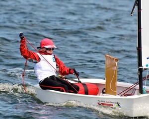 All hands on deck on an Optimist during the 2012 Audi Showdown regatta. photo copyright Dane Lojek taken at  and featuring the  class