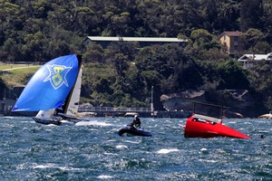 Pure Blonde races past a stricken Gotta Love It 7 - 18ft Skiffs: AEG 3-Buoys Challenge, Race 5 photo copyright Frank Quealey /Australian 18 Footers League http://www.18footers.com.au taken at  and featuring the  class