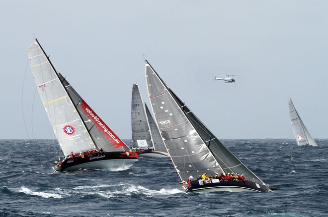 Sailors with Disability, Southern Exposure and KLC Bengal 7 battle it out - Rolex Sydney to Hobart ©  Alex McKinnon Photography http://www.alexmckinnonphotography.com