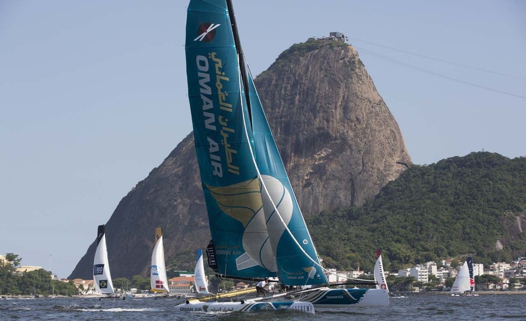Oman Air leads the fleet downwind crossing in front of iconic Sugarloaf mountain in Rio - 2012 Extreme Sailing Series - Act 8 Rio &copy; Lloyd Images http://lloydimagesgallery.photoshelter.com/