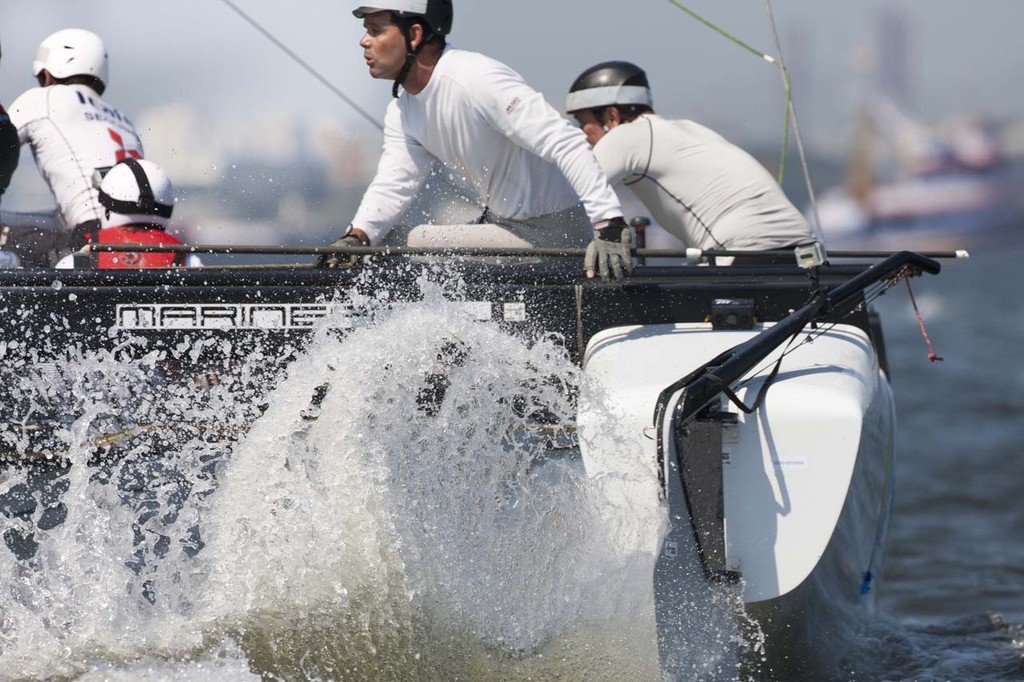 Brazilian Olympic sailing legend, Torben Grael, on the helm of local boat, Team Brasil - 2012 Extreme Sailing Series - Act 8 Rio &copy; Lloyd Images http://lloydimagesgallery.photoshelter.com/