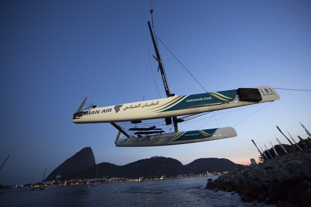 Oman Air is craned out for over-night repairs after a collision with Red Bull Sailing Team on day 1 in Rio - 2012 Extreme Sailing Series - Act 8 Rio &copy; Lloyd Images http://lloydimagesgallery.photoshelter.com/