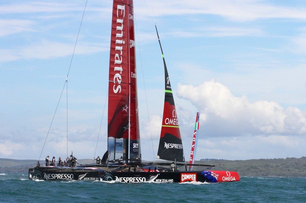 Emirates Team NZ&rsquo;s AC72 heads for home, leaving Luna Rossa to sail another beat alone, on the NZ teams final day of sailing on Wednesday. photo copyright Richard Gladwell www.photosport.co.nz taken at  and featuring the  class