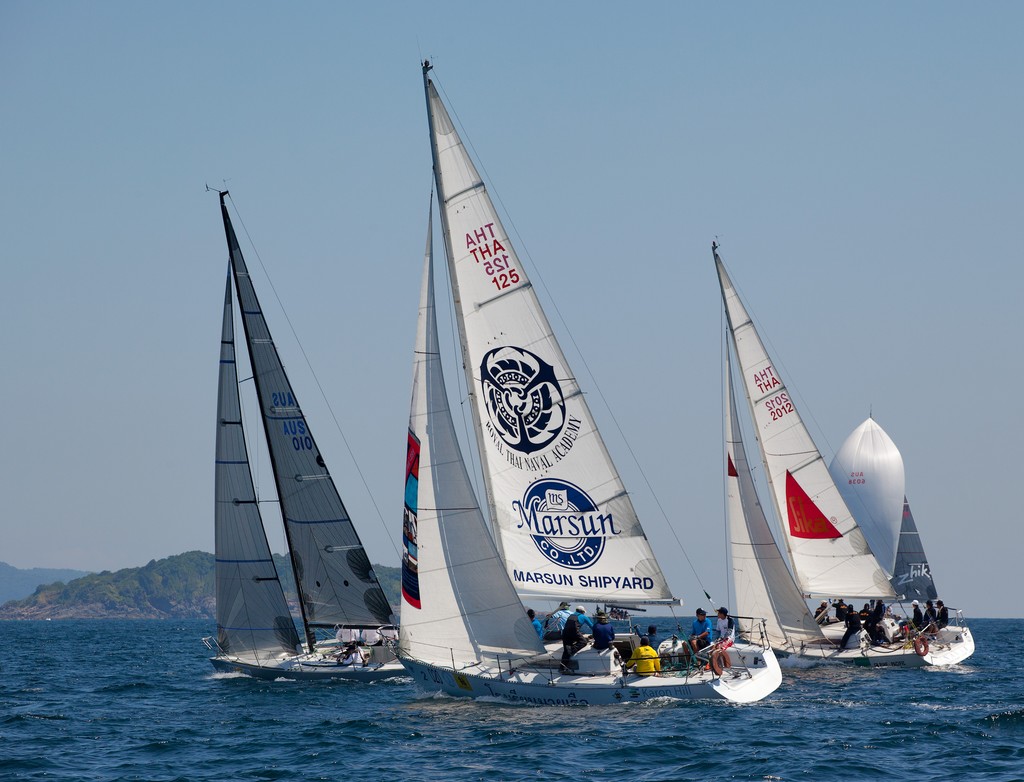 Phuket King's Cup 2012. Navy 1 and 2 in hot pursuit of Ichiban. photo copyright Guy Nowell taken at  and featuring the  class