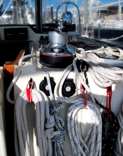 Coil line with a right-hand lay in a clockwise direction. Keep lines organized aboard your boat. That way they are ready for instant use and will run free though blocks or line-organizers. © Captain John Jamieson http://www.skippertips.com