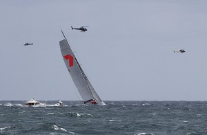 When you're out in front everybody wants a piece of you. Wild Oats XI has a squadron of choppers to keep her company. - Rolex Sydney Hobart Yacht Race photo copyright  John Curnow taken at  and featuring the  class