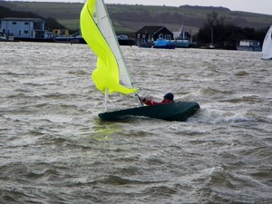 Bruce Huber in a broach and getting very wet! - Illusion Sailing - Christmas Cracker & Ice Breaker photo copyright Rudy Jurg taken at  and featuring the  class