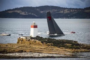 Wild Oats XI passes the Iron Pot Lighthouse at the entrance to the Derwent River on her way to a sixth line honours victory and new race record photo copyright ROLEX-Carlo Borlenghi taken at  and featuring the  class