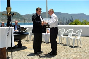St Helena Governor, Mark Capes, receives the Governor's Cup from Billy Leisegang (Manager of False Bay Yacht Club) to take back to the Island ready to be presented to the winners of the race. photo copyright Polly Tyekiff http://www.governorscup.co.za taken at  and featuring the  class