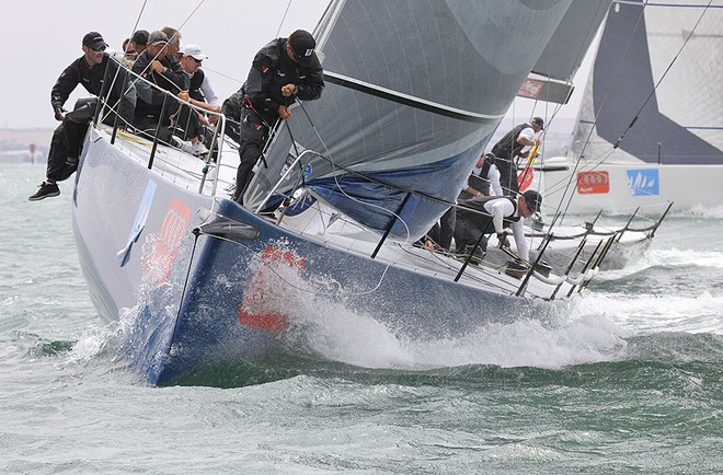 Shogun’s bowman feeds the tack out to the end of the bowsprit. - TP52 Southern Cross Cup ©  John Curnow