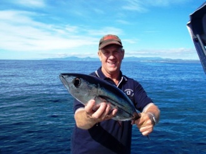 Craig with one of his many albacore. © Carl Hyland