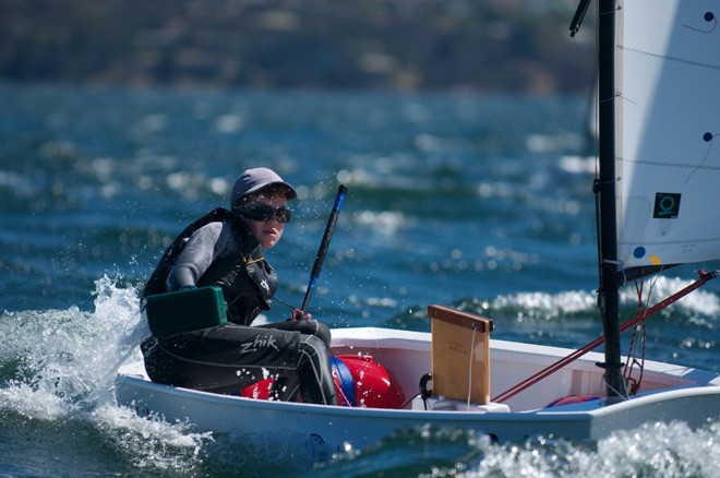Sam King baling as he sails downwind - 2013 International Optimist Australian Championship © Dane Lojek