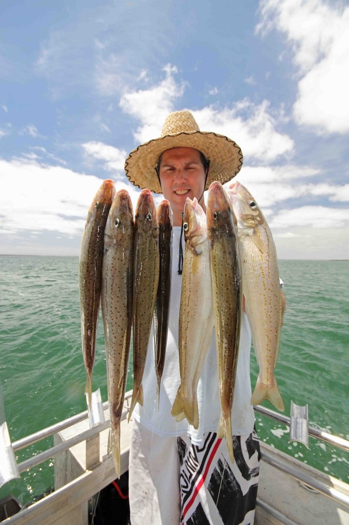 You know you have good fish when your hands are this full. photo copyright Jarrod Day taken at  and featuring the  class