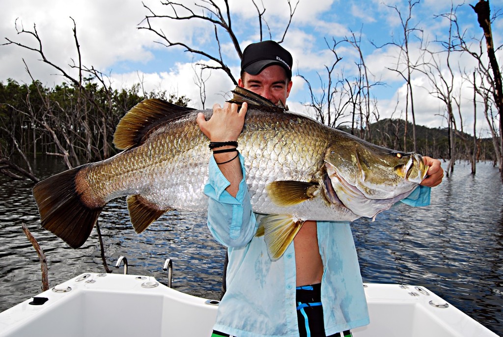 Lee Brake with a 113cm Teemburra Dam barramundi.  Fish like this were becoming less of a rarity in Teemburra before the floods.  Now the average size fish is around 60cm and 90cm is a rare fish (as per the results of recent MTA Tournaments held there). photo copyright Lee Brake taken at  and featuring the  class