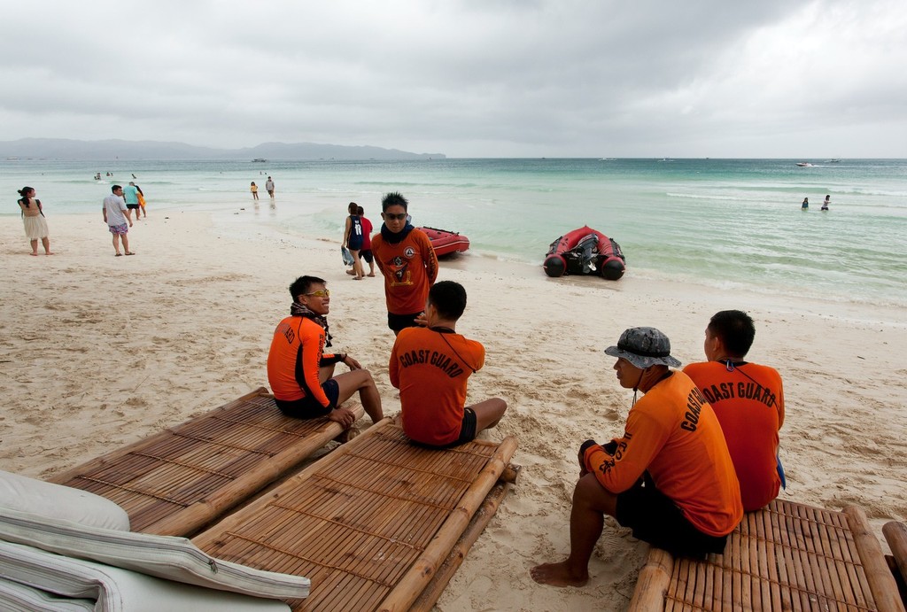 Boracay Cup Regatta 2013. Time out for the Coastguard. © Guy Nowell http://www.guynowell.com