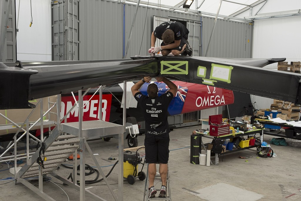 Emirates Team New Zealand sailors, boat builders and shore crew assemble the parts of the teams second AC72. 16/1/2013 photo copyright Chris Cameron/ETNZ http://www.chriscameron.co.nz taken at  and featuring the  class