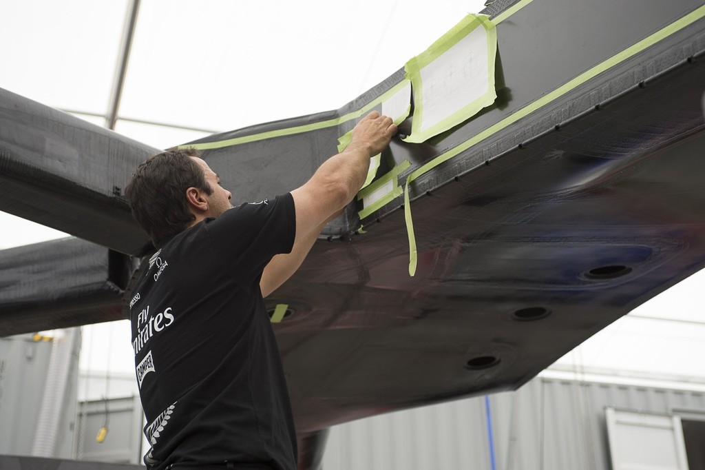 Emirates Team New Zealand hydraulics engineer Vito Vattuone lays out parts drawing to check positioning of systems on the teams second AC72. 17/1/2013 photo copyright Chris Cameron/ETNZ http://www.chriscameron.co.nz taken at  and featuring the  class